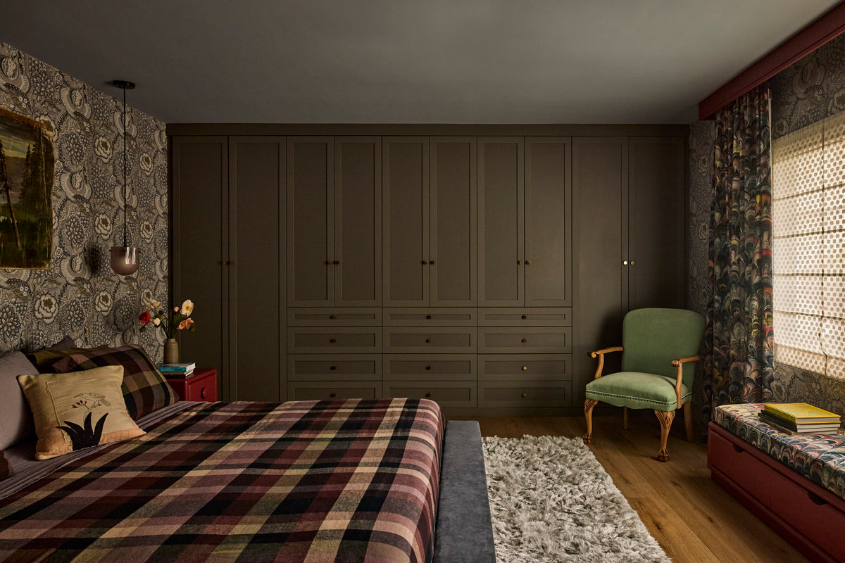 Olive built-in wardrobes and plaid bedding in the primary bedroom, Martin & Brockett Canyon