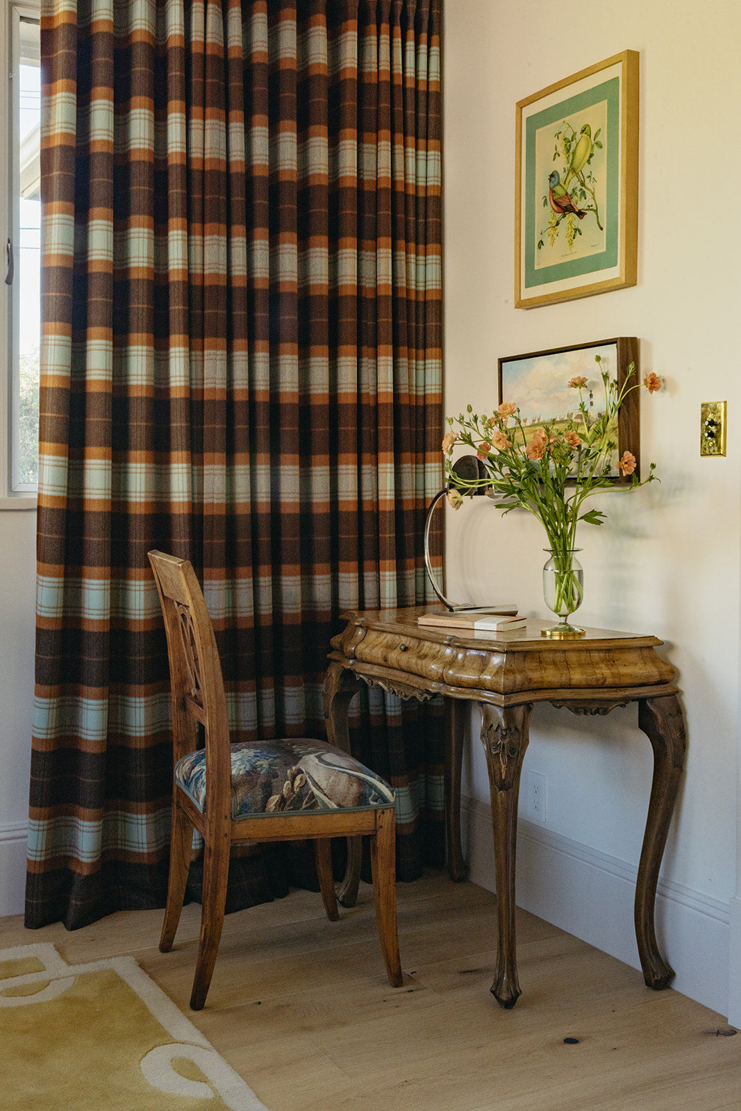 Antique console and chair beside striped floor-length drapery, Martin & Brockett Pasadena