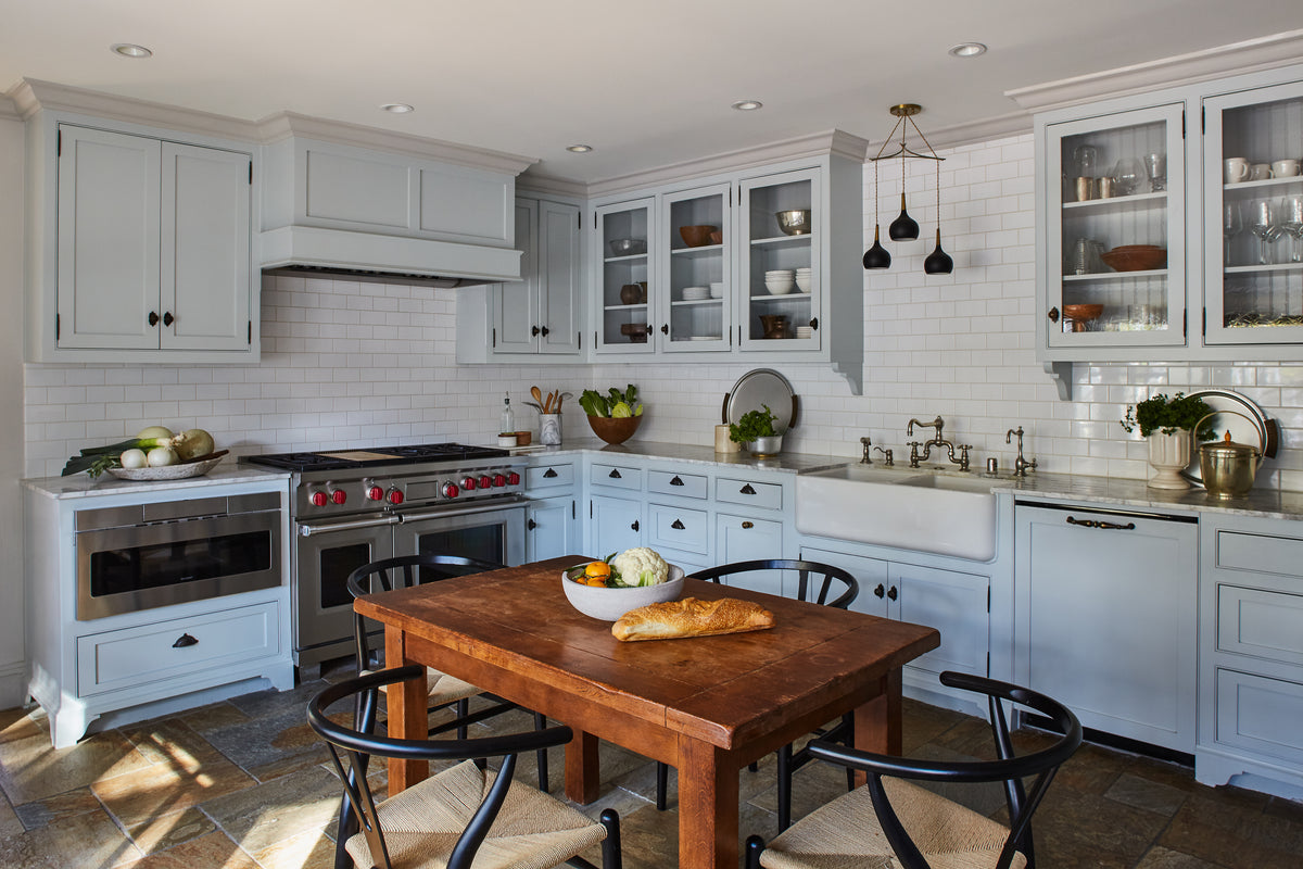 Pale blue cabinetry, subway tile and a professional range, Martin & Brockett Studio City kitchen