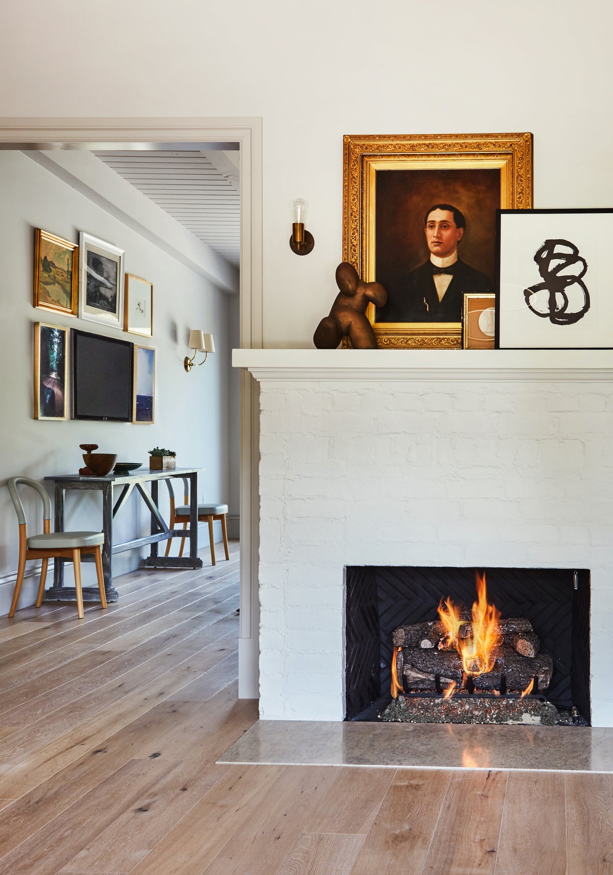 Portrait painting above the white brick fireplace, Martin & Brockett Toluca Lake living room