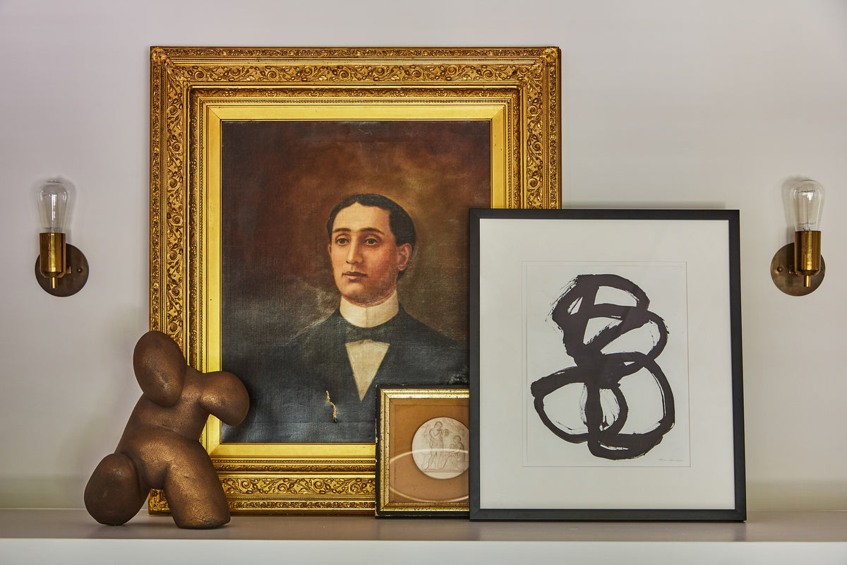Gilt portrait, abstract drawing and bronze sculpture on the mantel, Martin & Brockett Toluca Lake