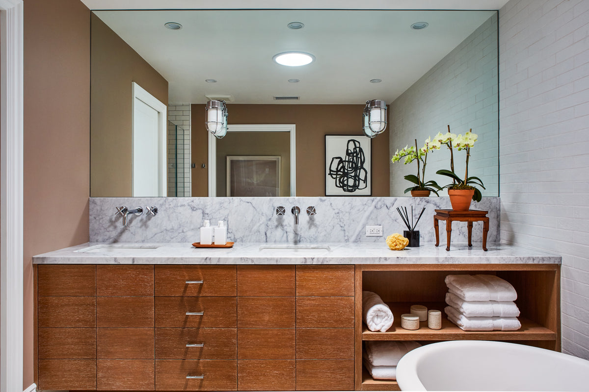 Walnut double vanity and marble counter against white painted brick, Martin & Brockett Toluca Lake